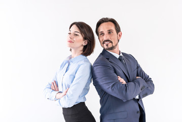 Positive mature man and young woman are posing together