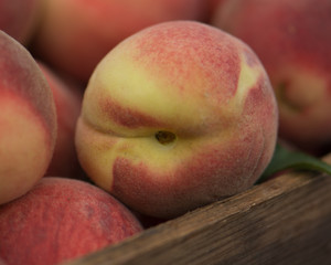 Organic Peaches in a Wooden Crate
