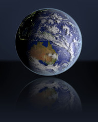 Globe facing Australia in dark
