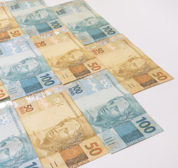 Brazilian money background. Bills called Real, different values. Economy of Brazil concept image.