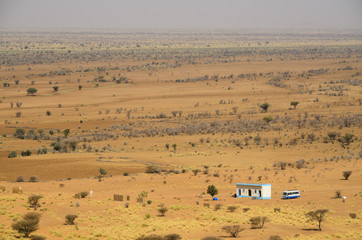 Bus stop in the middle of african desert