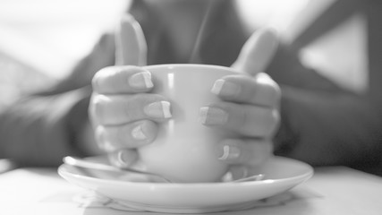Warming hands on coffee