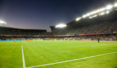 evening stadium arena soccer field defocused background