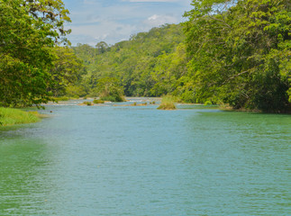The Macal River Flowing below Xunantunich Archaeological Reserve. The Ancient Mayan ruins outside of San Ignacio, Belize.