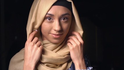 Portrait of an attractive young modern Muslim woman in hijab.