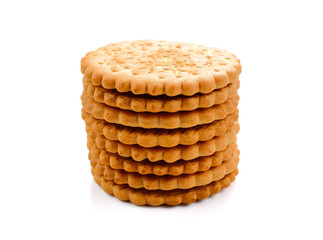 BISCUITS - A stack of delicious wheat round biscuits isolated on white