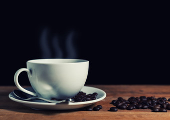 Vintage coffee bean on brown wooden