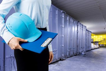 storage warehouse and young worker.