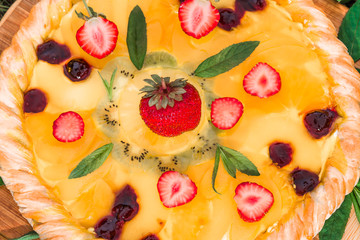 Fruit pizza with strawberries kiwi pineapple