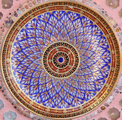 Circular ceramic pattern background on wall in Wat Phasornkaew in Phetchabun, Thailand.