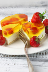 Fruity cake with jelly and strawberries