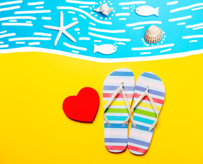 Summertime flip-flops and heart shape box