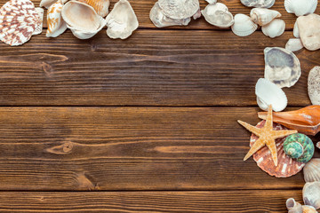 Beach accessories on wooden board