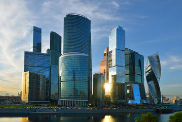 Plakat Moscow International Business Centre (MIBC) is commercial district. Located east of Third Ring Road in Presnensky District of Central Administrative Okrug. Evening
