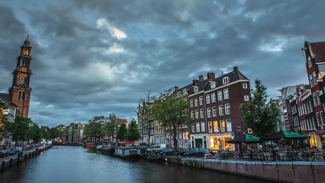 The most famous canals and embankments of Amsterdam. General view of the cityscape and traditional Netherlands architecture. 4K Time Lapse Footage.