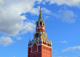 Moscow Kremlin clock on Spasskaya tower with soviet star on top, symbol of Moscow and famous...