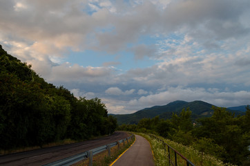 Fototapeta na wymiar cloudy sky in nature while hiking in nature in the summer