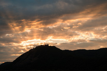 rays of sunshine on the beach by the river in summer morning