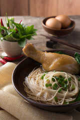 Asian noodles, bowl of noodles with vegetables and chicken