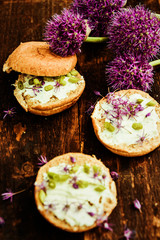 Aromatic sandwich with egg, mackerel and edible flowers of chives