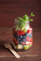 fruit salad in mason jar strawberry blueberry kiwi apple mint