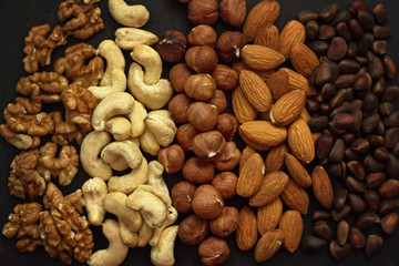 close up rows of nuts on the table , top view.