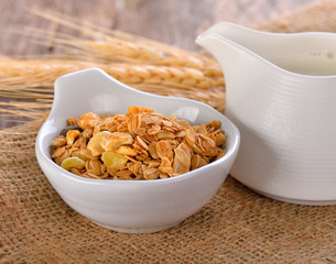 Granola nut and fruit on wooden background