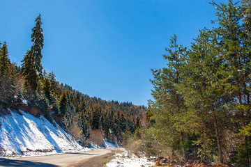Road in the mountains against the blue sky. Georgia.