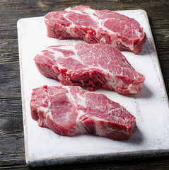Raw pork steaks