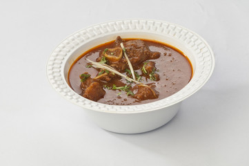 mutton curry in disposable bowl