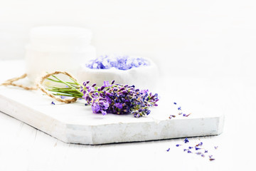 Obraz na płótnie Canvas Bunch of lavender flowers on a white wooden background, copy space .