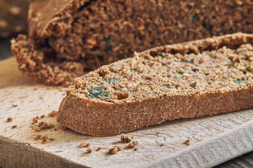 Homemade chrono diet bread on wooden cutting board