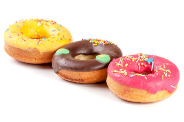 three glazed donut isolated on white background