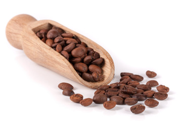 coffee beans in a wooden scoop isolated on white background
