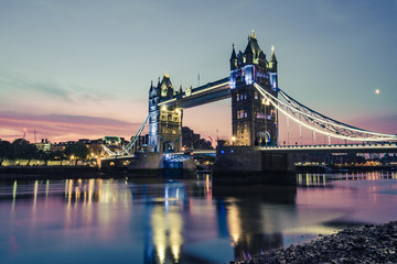 Fototapeta na wymiar London Tower Bridge illuminated at dusk