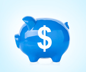 Blue ceramic piggy bank on white background