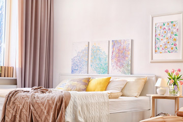 Interior of modern bedroom with cozy bed