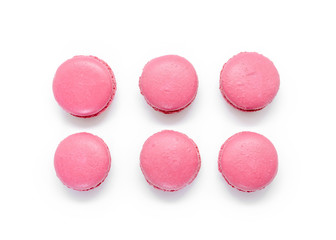 Sweet french macaroons on white background.