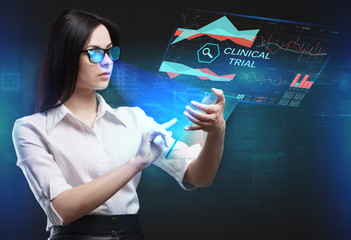 The concept of business, technology, the Internet and the network. A young entrepreneur working on a virtual screen of the future and sees the inscription: Clinical trial