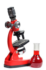 Microscope for biology and flasks on white background
