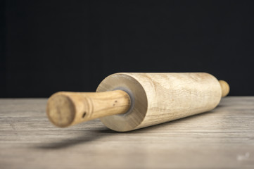 Fototapeta premium Close up shot of a rolling pin on table
