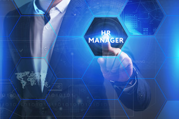 Business, Technology, Internet and network concept. Young businessman working on a virtual screen of the future and sees the inscription: HR manager
