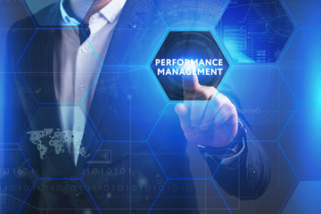 Business, Technology, Internet and network concept. Young businessman working on a virtual screen of the future and sees the inscription: Performance management