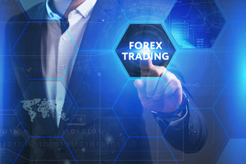 Business, Technology, Internet and network concept. Young businessman working on a virtual screen of the future and sees the inscription: Forex trading