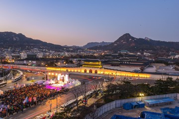  korean traditional palace in seoul, city night scape, crowed