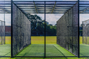 A cricket pratice net on green grass in Melbourne, Victoria, Australia