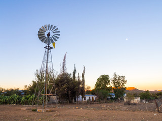 Windmill next to a farm, Khomas Highlands, Namibia.