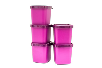 Set of violet plastic food containers isolated