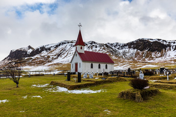 Small church with graveyard in the south of Iceland