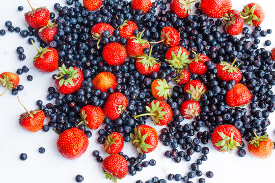 Berries variety - berries background: strawberries, blueberries